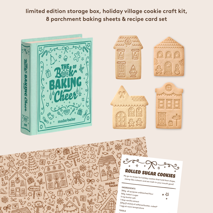 Baking kit with cookie cutters, recipe card, and packaging on a white background