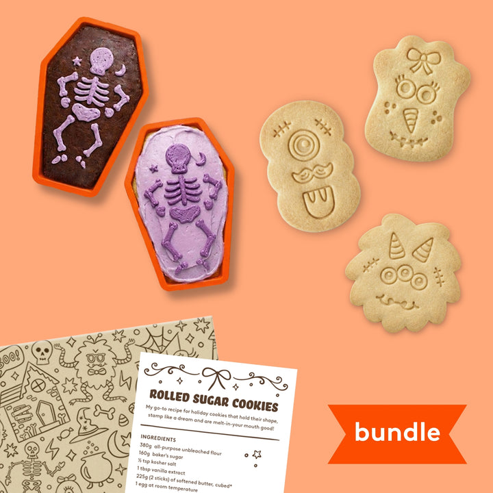 Halloween-themed cookie cutters and decorated cookies on an orange background with 'bundle' text.