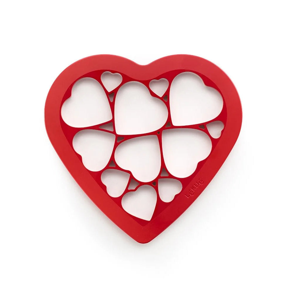 Red heart-shaped cookie cutter with multiple heart shapes on a white background