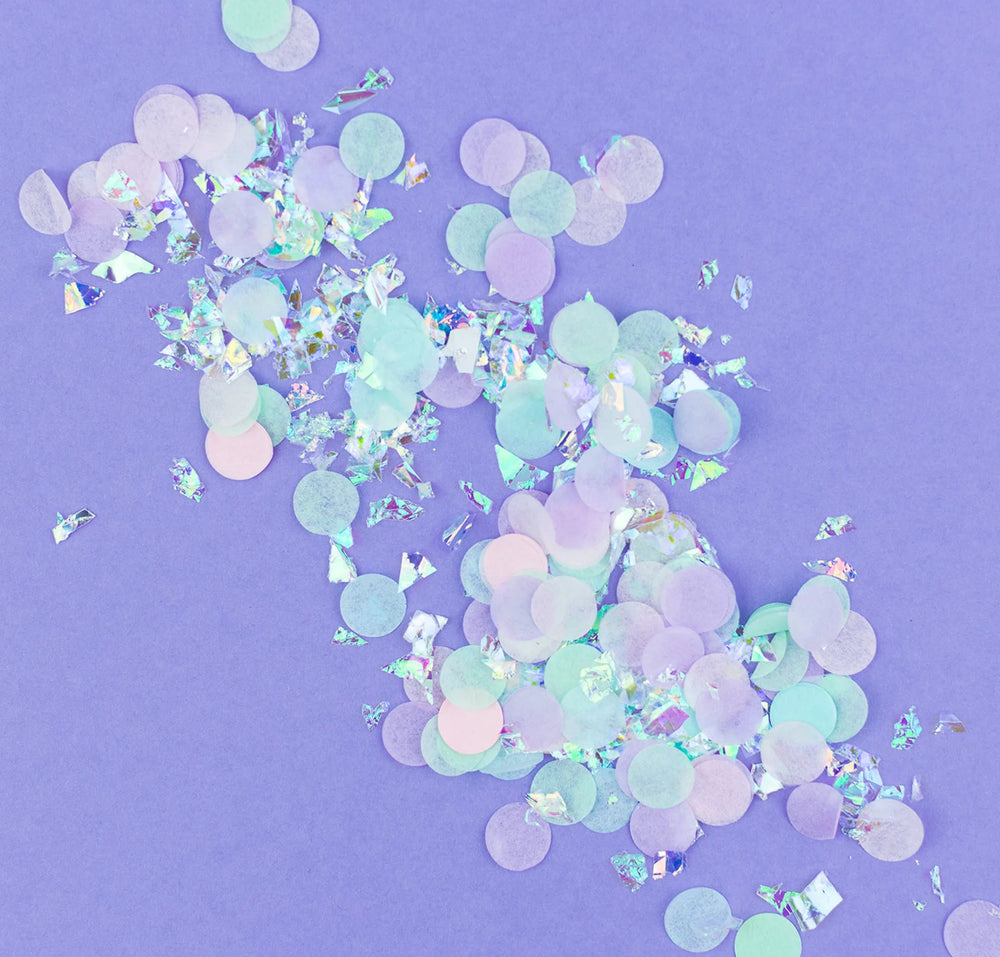 Pastel-colored confetti on a purple background