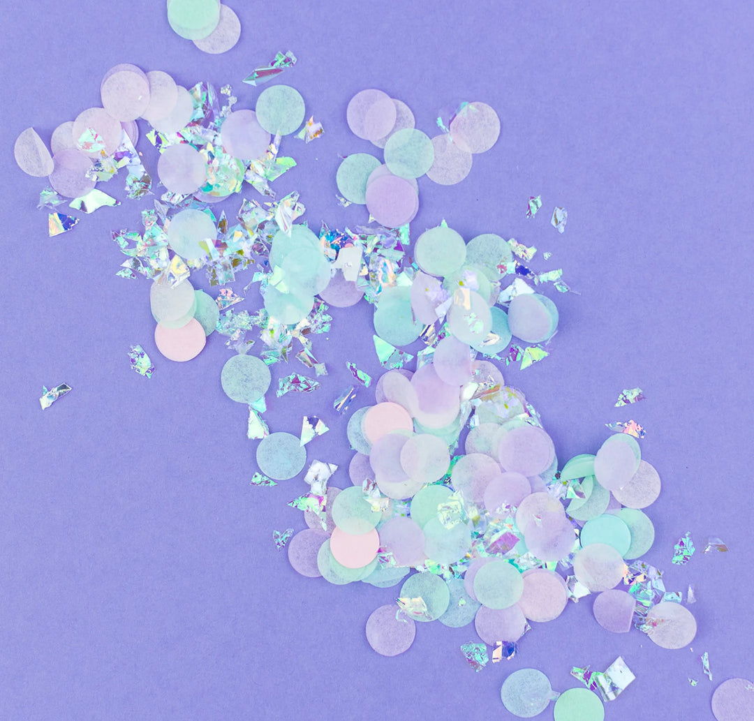 Pastel-colored confetti on a purple background