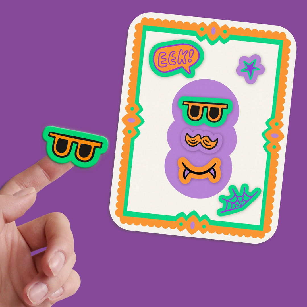 Colorful card with a cartoon character stickers and a hand displaying one sticker on their finger on a purple background