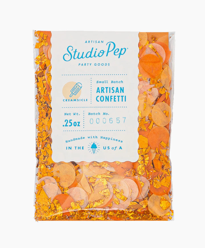 Packaged orange artisian confetti with Studio Pep branding on a white background