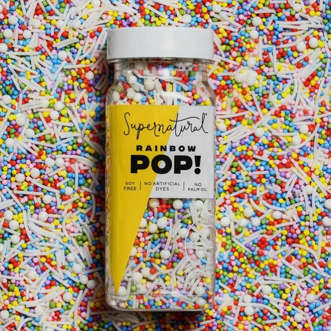 Supernatural Rainbow Pop! container surrounded by colorful sprinkles