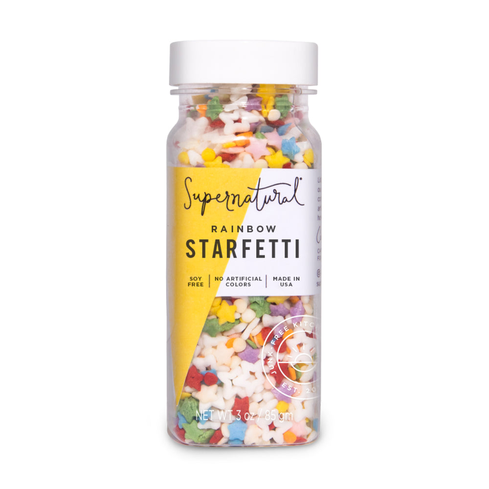 Supernatural Rainbow Starfetti sprinkles in a jar on a white background