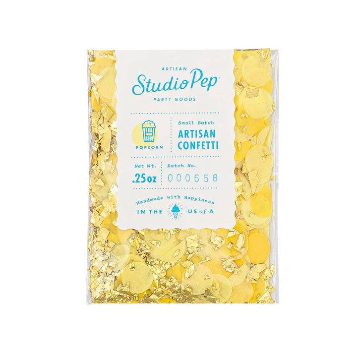 Packaged artisian yellow confetti with StudioPop branding on a white background